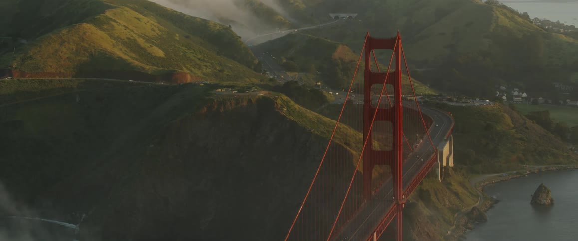 Large bridge near hilly landscape