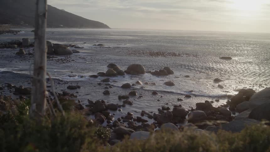 The ocean tide flows towards the shore