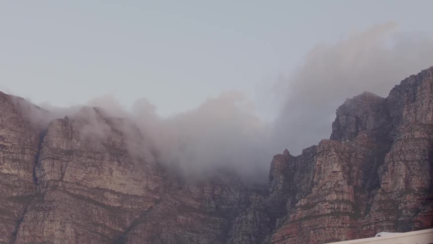 Clouds roll over rocky plateau