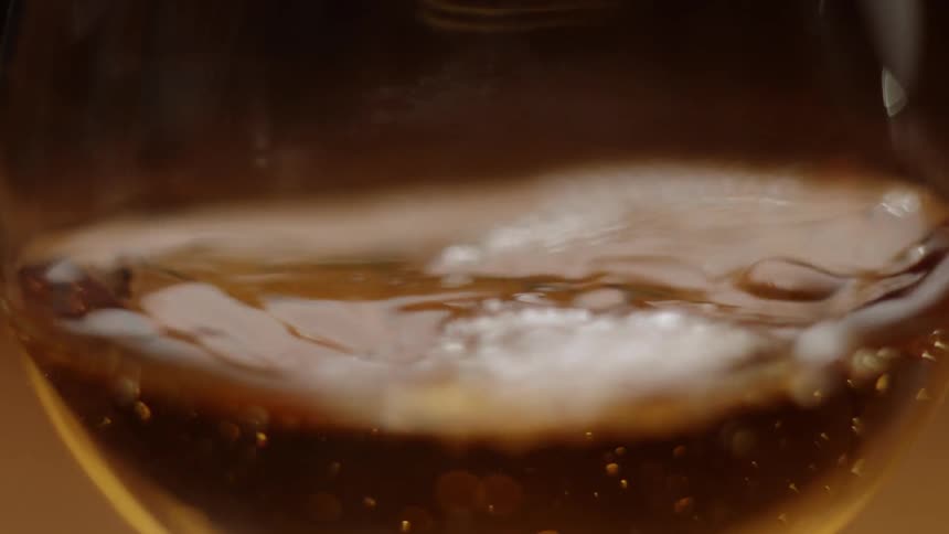 Liquid pours into a glass