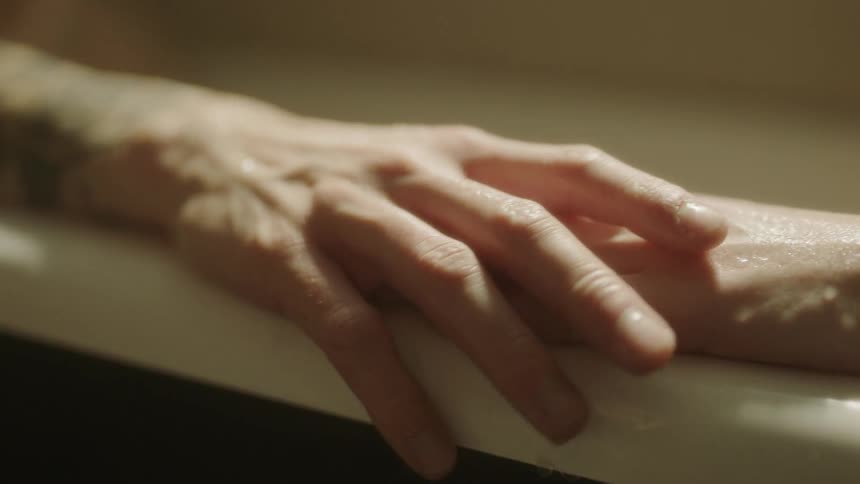 Man and woman hold hands