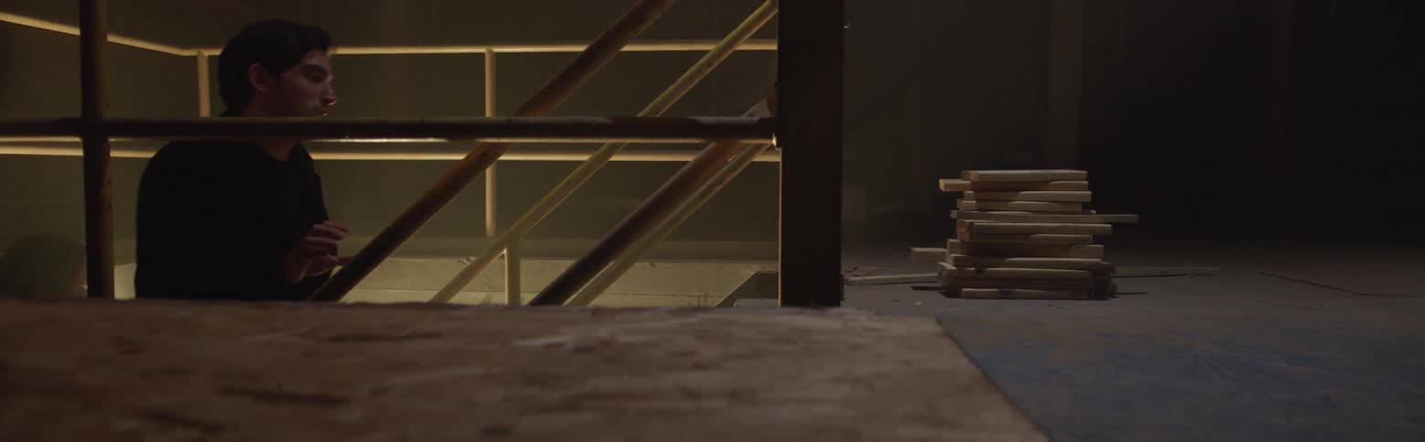 Man walks up a staircase