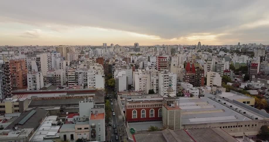 Buildings in large city on cloudy evening