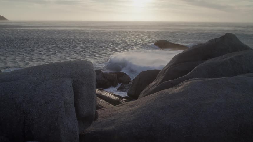 Sun shines over the ocean waves