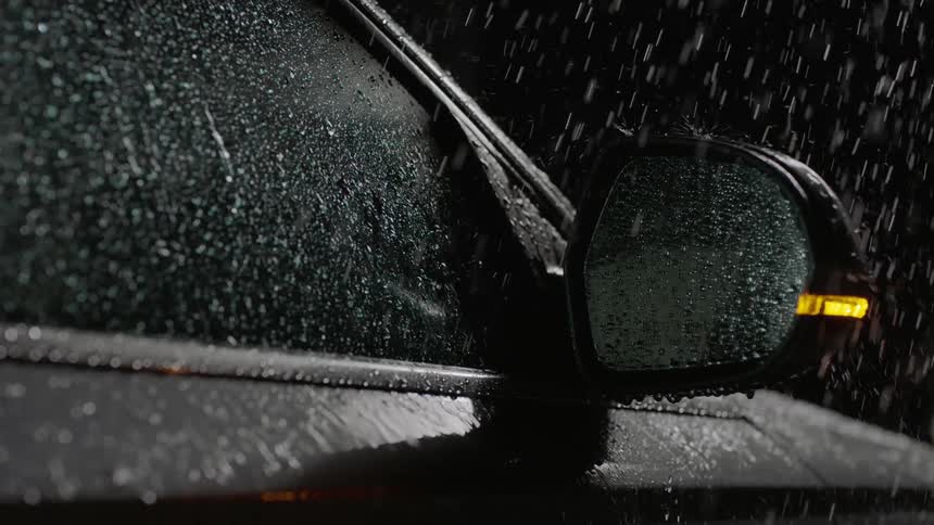 Rain falls on the car