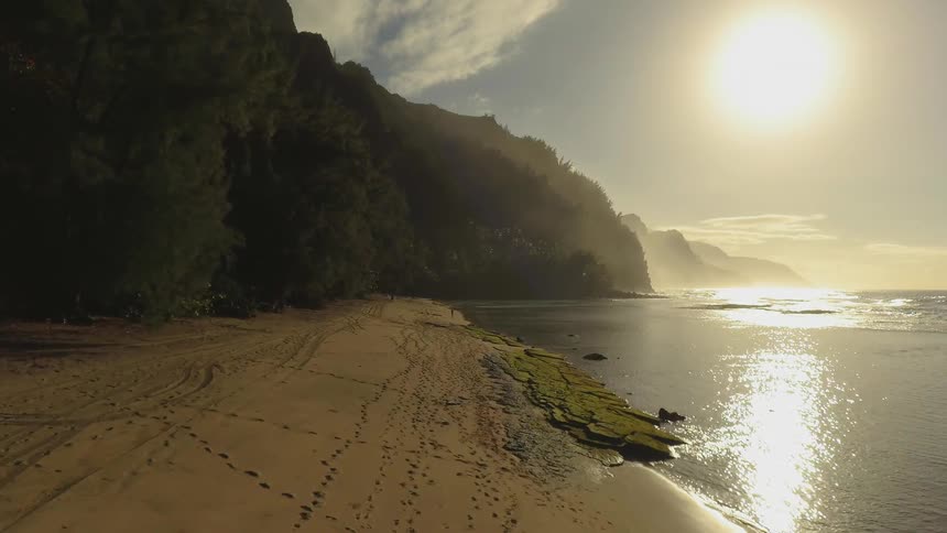 The sun shines on the ocean waters