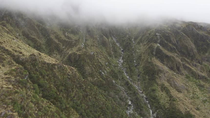 Cliffs enshrouded by fog