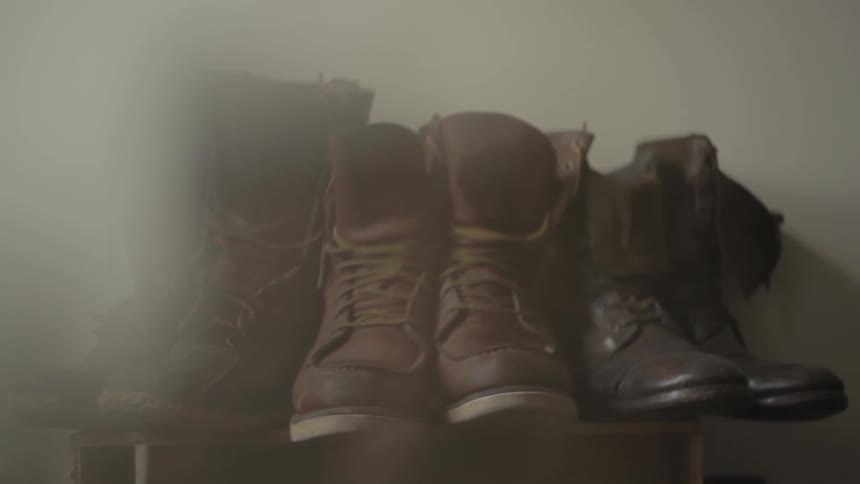 Row of boots sitting together empty