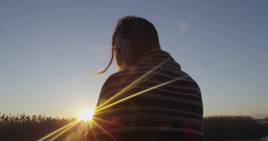 A person staring off at the horizon
