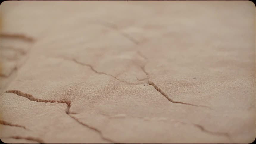 Sand cracks and crumbles