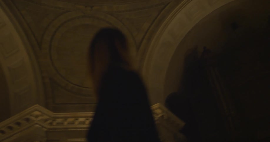 Woman standing in a large building