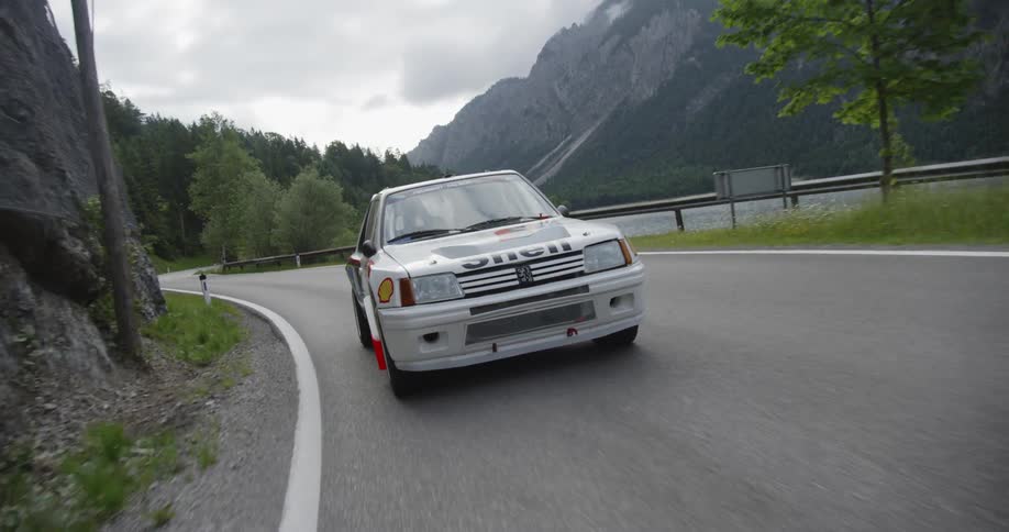 Car drives on a mountain road