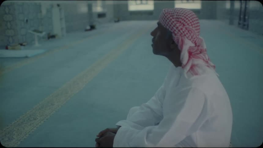 An arab man sits and prays