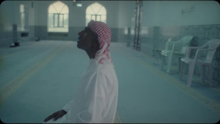 A man prays inside of a mosque