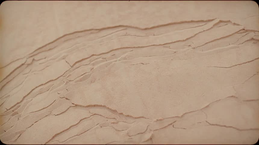 Sand cracks and crumbles