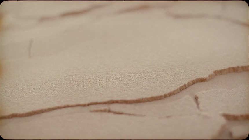 Sand on a slope cracks and slides