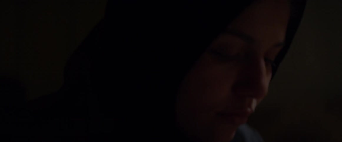 Baby cries and flails its arms