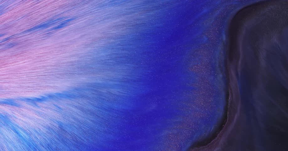 Multiple colors of liquid swirling together