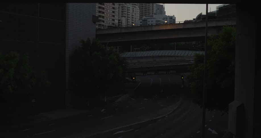 A highway over train tracks in the city
