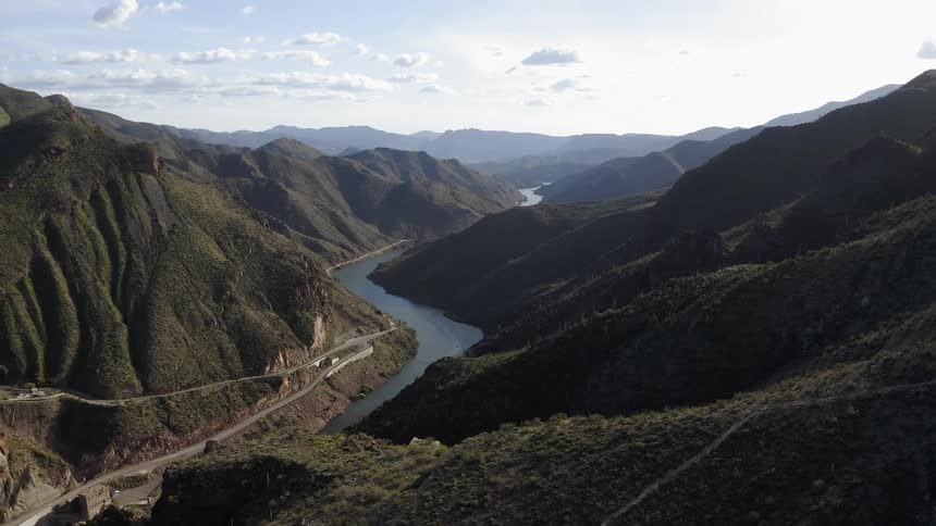 River cutting through green mountains