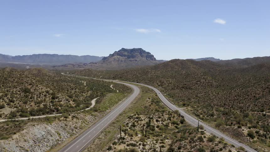 Vehicle drives on a winding country road