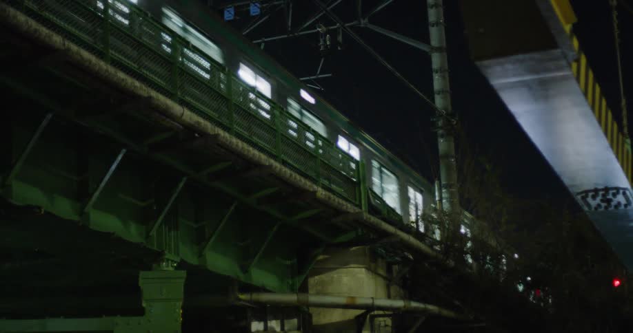 Subway passing overhead at night
