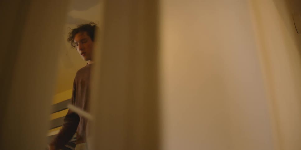 A man is dancing behind the door