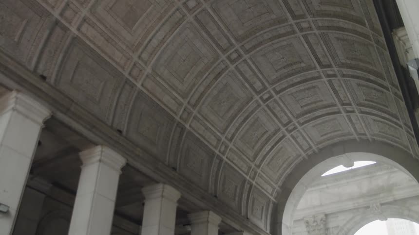 Curved ceiling sits above the pillars