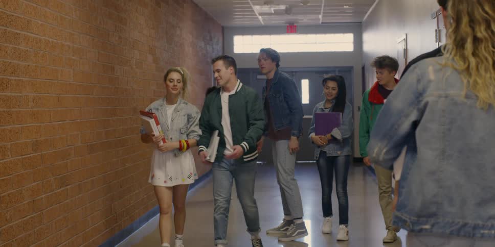 High school students walk in the hall