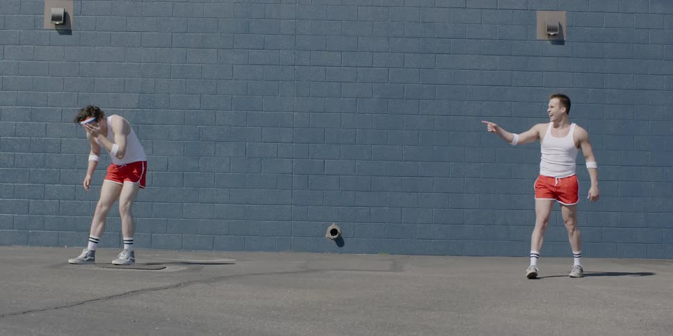A boy hits another in the head with a ball during outdoor gym class