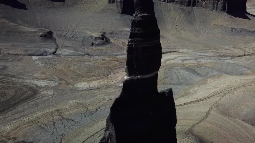 A large formation sticks out of the canyon