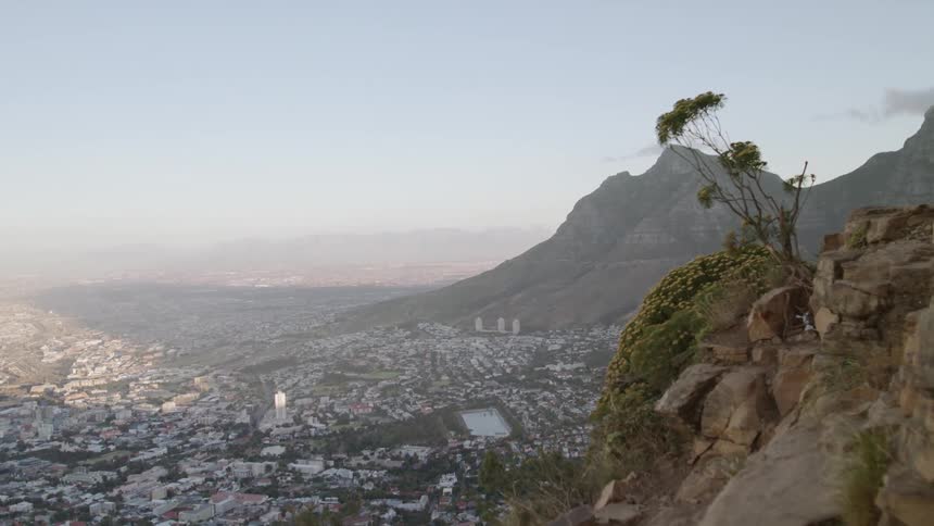 The town below lies by a mountain