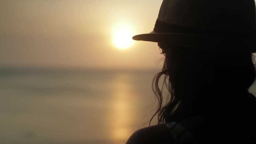 A person watching the sunset