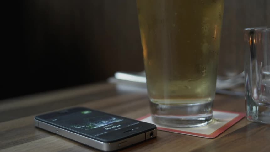 Phone on a table starts ringing