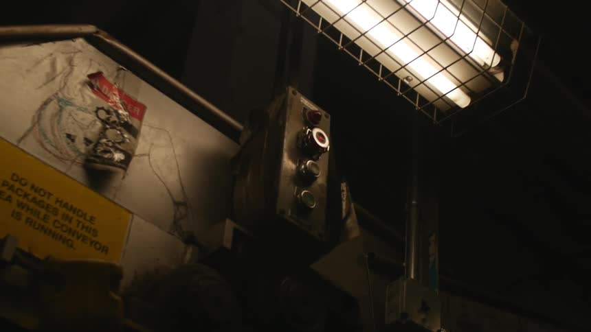 Fluorescent lighting shining down on equipment