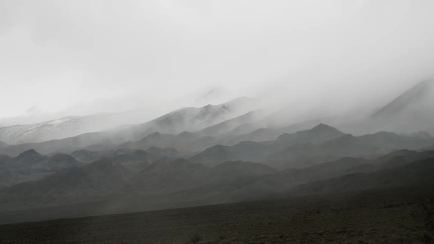 Mist covered mountain peaks