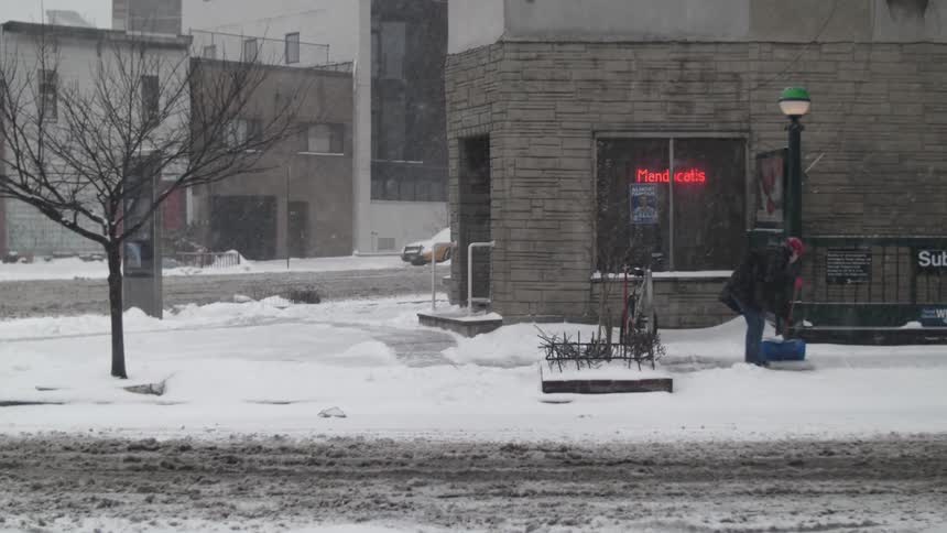 People shoveling snow