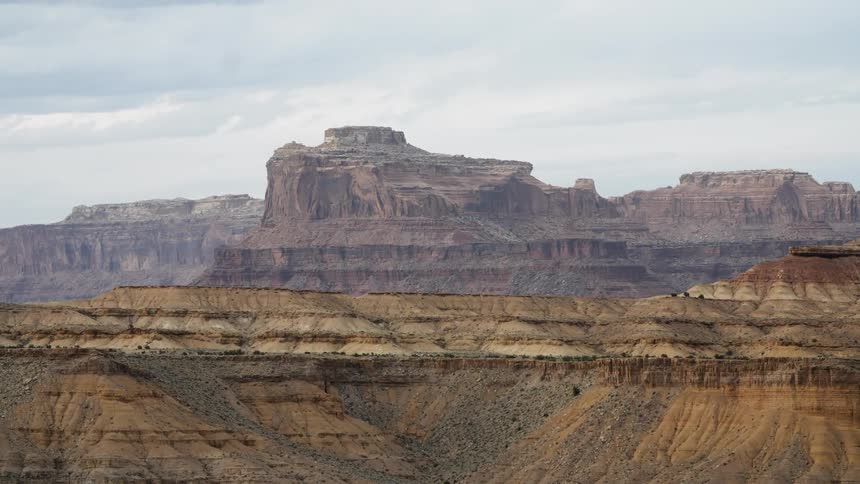 Rocky canyon and plateau with clouds overhead
