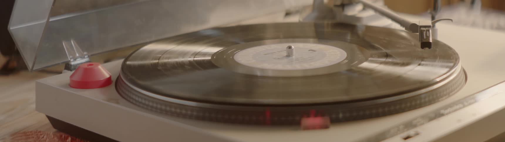 Long playing record spins on a record player
