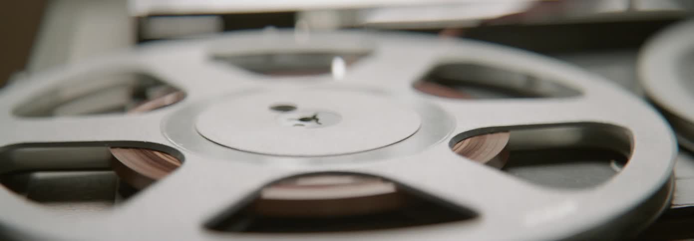 Tape reel spins as the tape comes loose