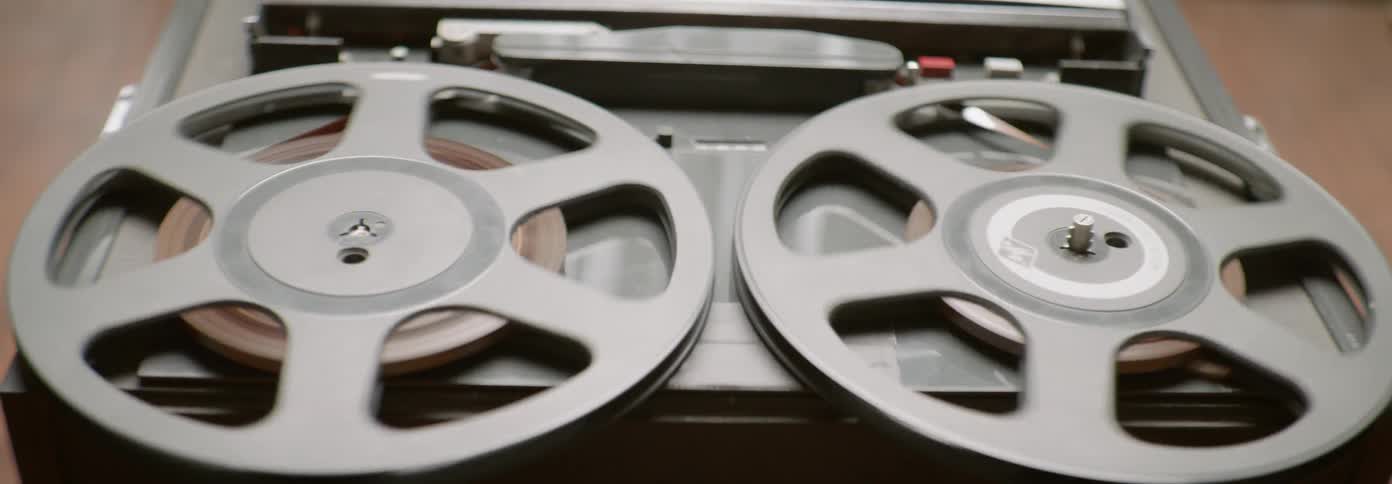 Film reels spin on a projector