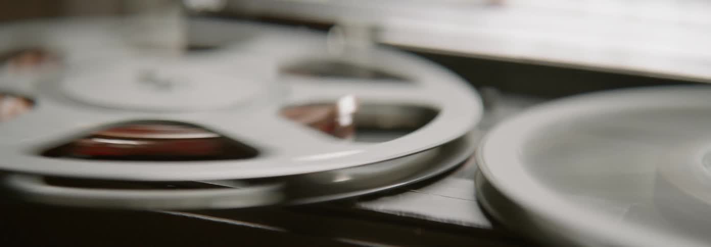 Film reels spin on a projector