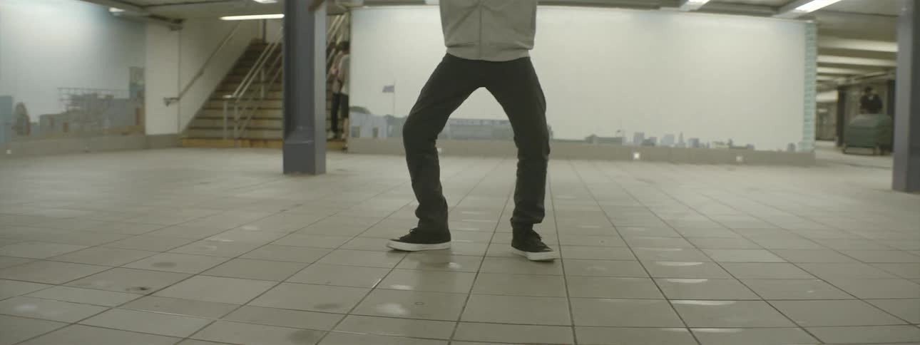 Boy dancing in a subway