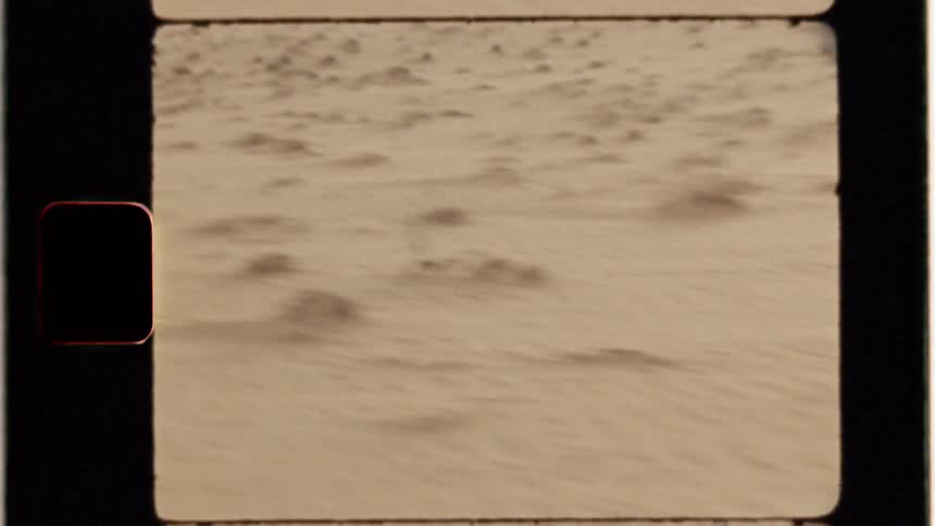 Piles of sand sit in a desert