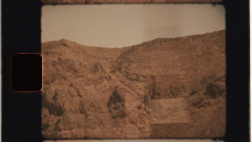 A car travels in rocky mountains