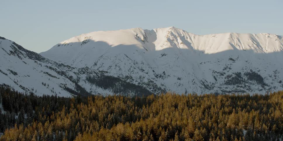 Snow covers the mountain landscape