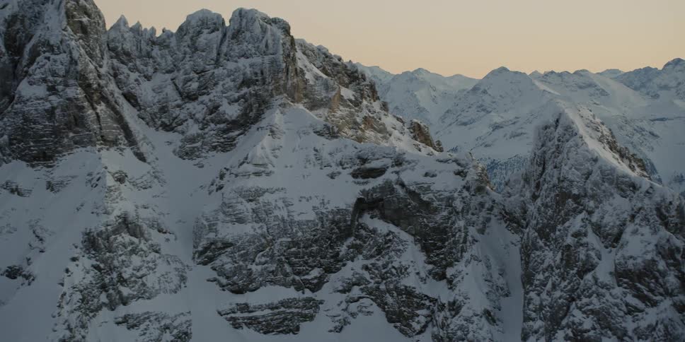 Snow covers the mountain landscape