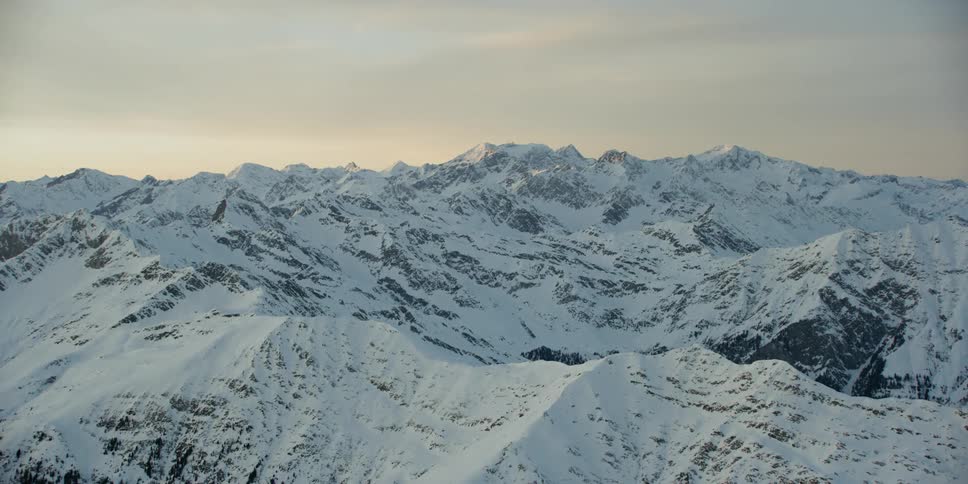 Snow covers the top of the mountains