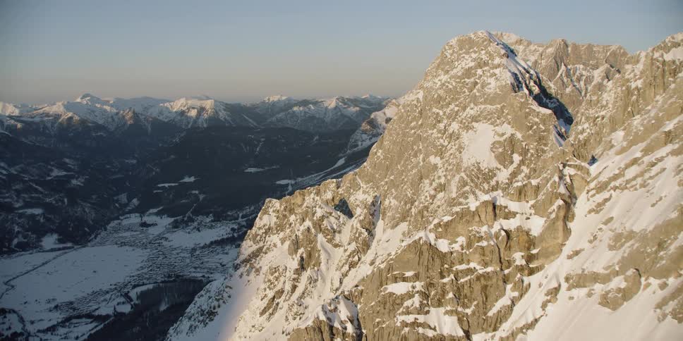 Snow covers the mountain landscape