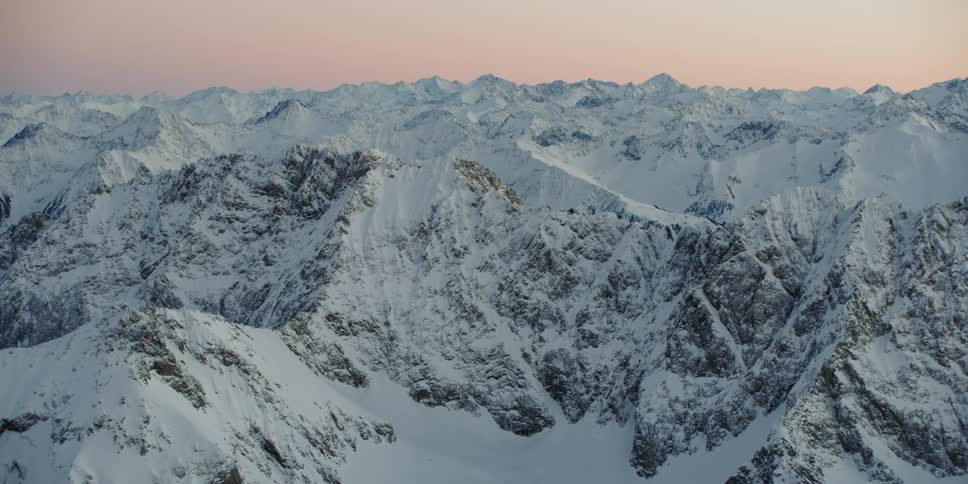 Snow covers the mountain landscape